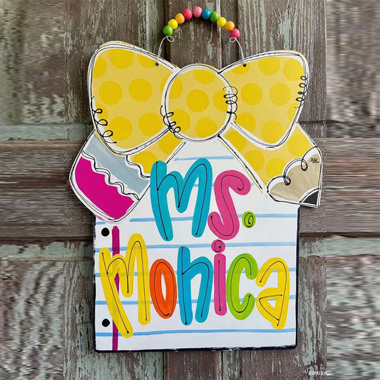Notebook paper with pencil bow door hanger